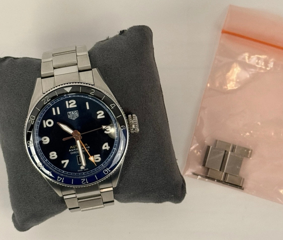 TAG Heuer Autavia GMT 60th Anniversary Blue Dial Batman Bezel Calibre 7 42mm Full Set